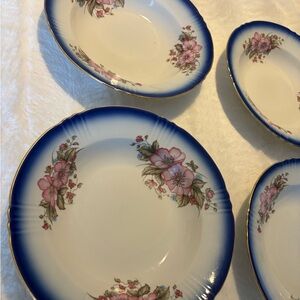 Four antique porcelain floral bowls marked on bottom